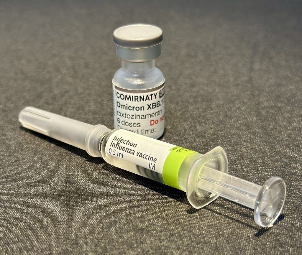 Vaccine vial and syringe prepared for injection